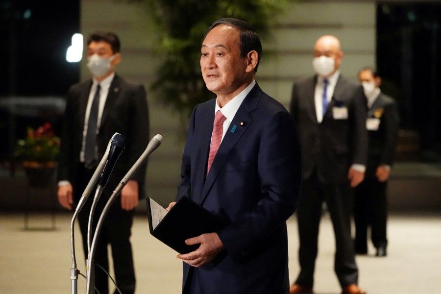 Japanese Prime Minister Yoshihide Suga speaks to media after a government task force meeting at the prime minister's office, Tokyo, Japan, 9 April 2021. (Eugene Hoshiko/Pool via Reuters)