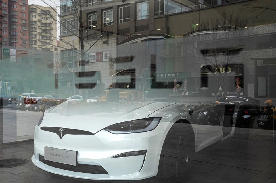 A Tesla Inc. Model X electric vehicle on display inside one of the company’s dealerships in Beijing, China, on 7 March 2025. (Na Bian/Bloomberg)