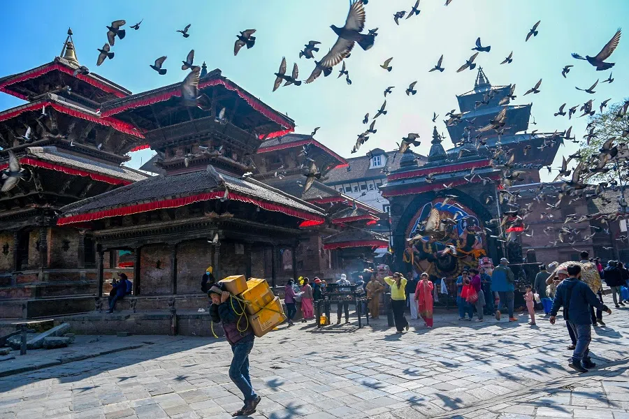 Locals walk at Durbar Square in Kathmandu, Nepal, on 13 November 2024. (Prakash Mathema/AFP)