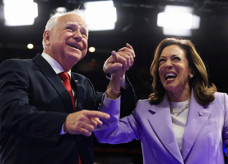 Democratic presidential candidate and US Vice President Kamala Harris and her vice-presidential running mate Minnesota governor Tim Walz attend a campaign event at University of Nevada, Las Vegas, 10 August 2024. (Kevin Mohatt/Reuters)