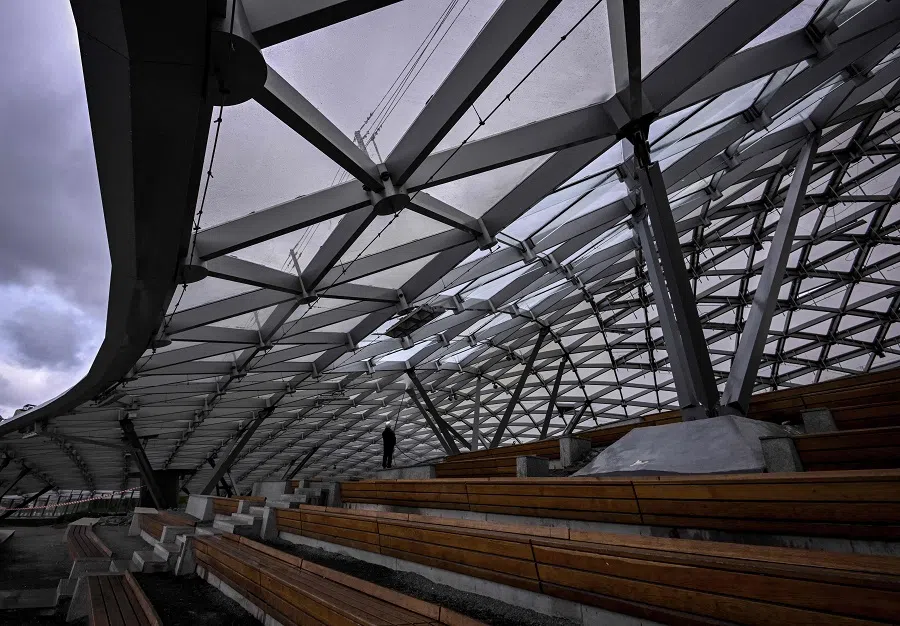 A worker cleans a pavilion roof at the Zaryadye Park in central Moscow, Russia, on 6 September 2022. (Yuri Kadobnov/AFP)