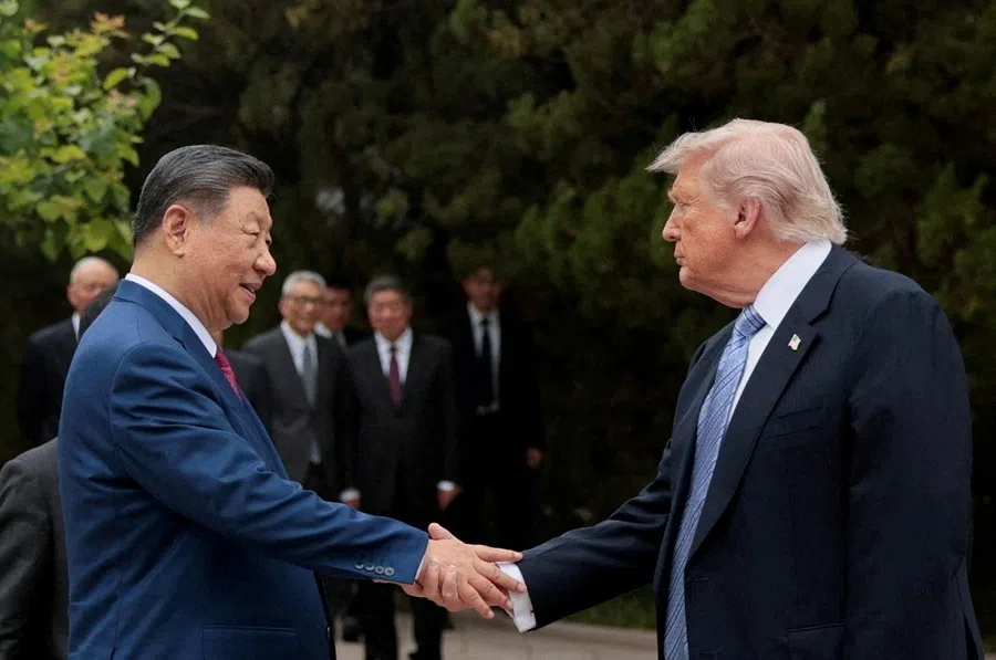 US President Donald Trump shakes hands with Chinese President Xi Jinping while leaving after a visit to the Zhongnanhai Garden in Beijing, China, 15 May 2026.