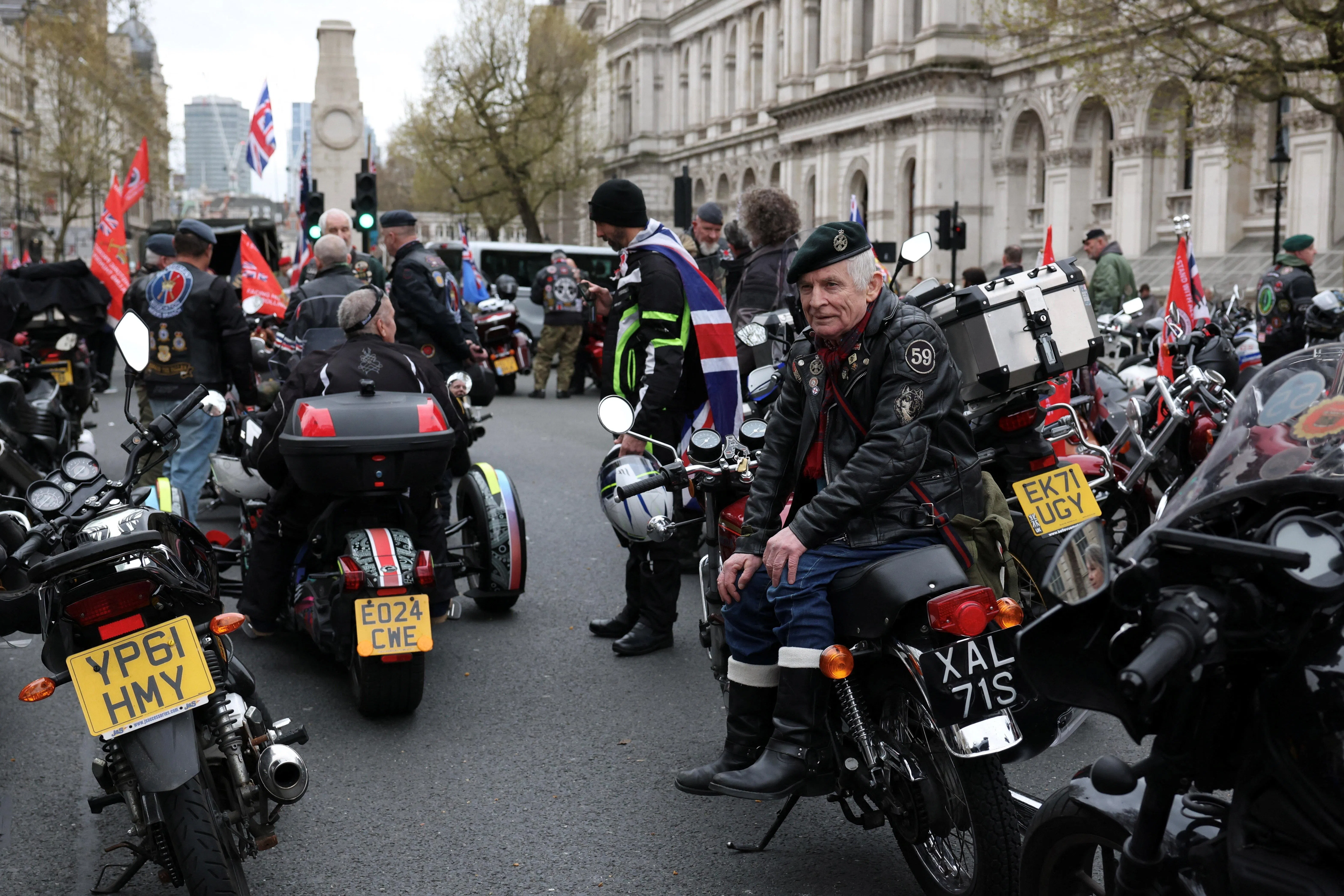 George Rix, a veteran of the Royal Green Jackets, sits on his 1978 Honda motorcycle during a protest on Whitehall against the prosecution of soldiers in Northern Ireland, in London, UK, on 3 April 2026. (Kevin Coombs/Reuters)