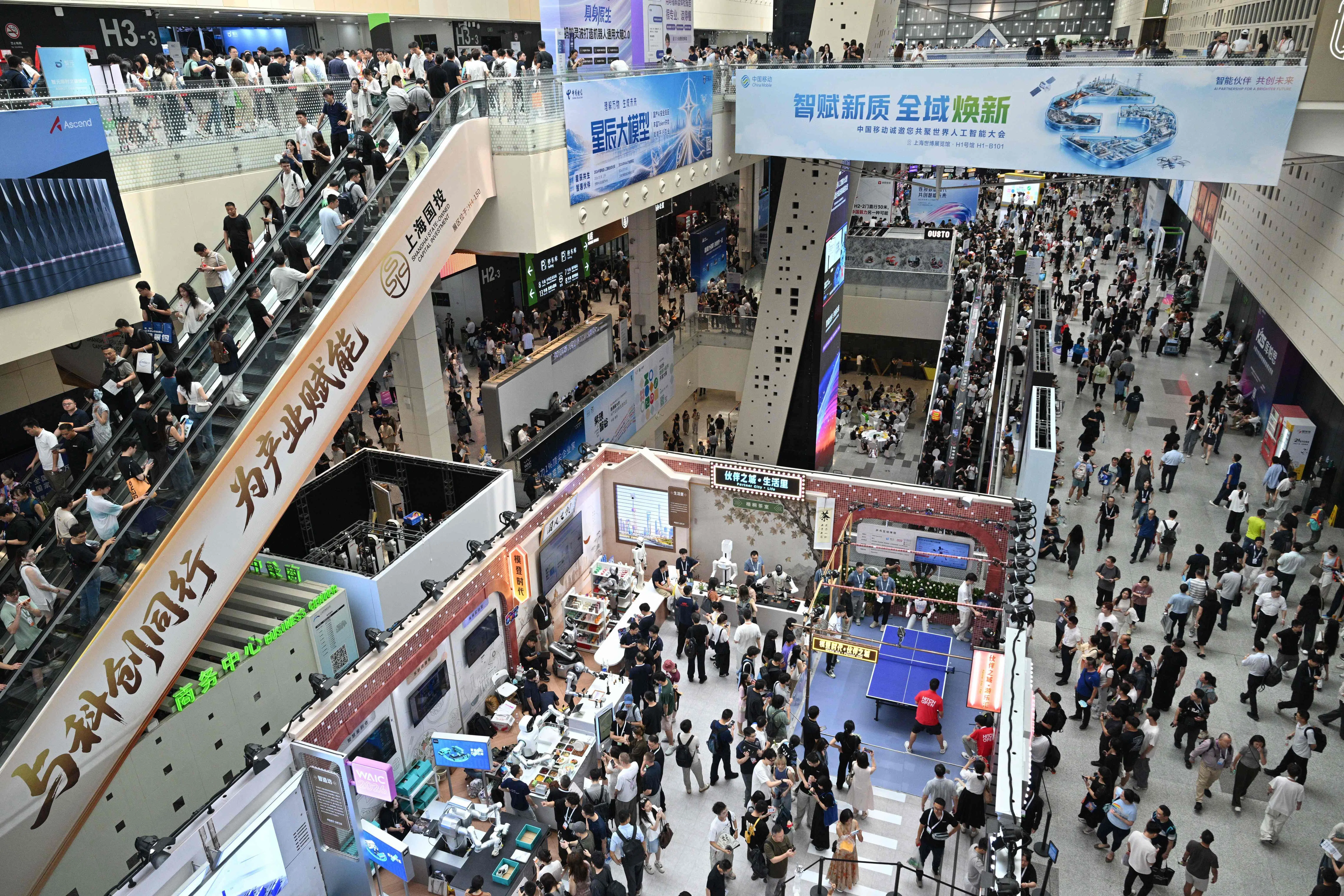 People visit the World Artificial Intelligence Conference (WAIC) in Shanghai on 18 July 2026.