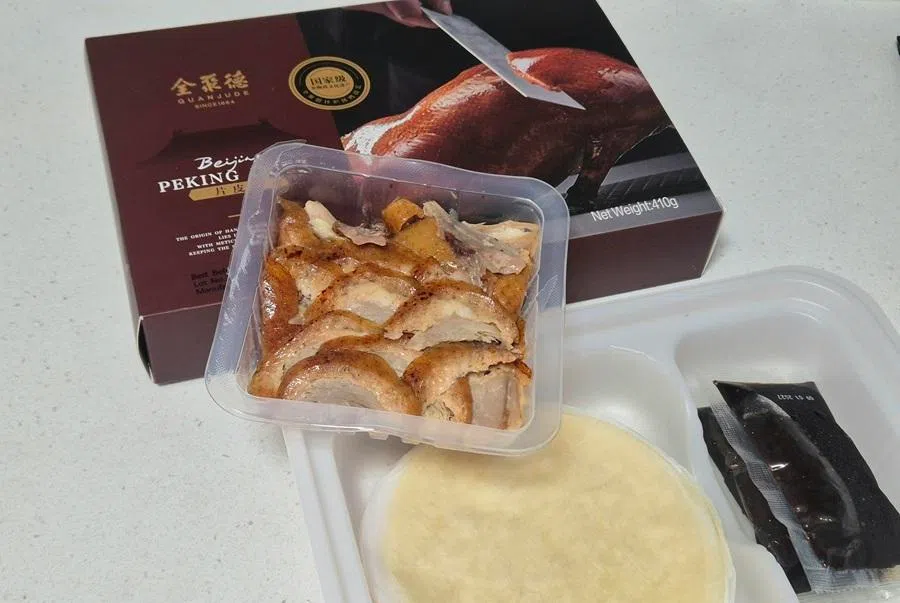 Quanjude’s frozen packaged version of sliced Peking duck is available at FairPrice Xtra, Jurong Point. (Tang Ai Wei/SPH Media)