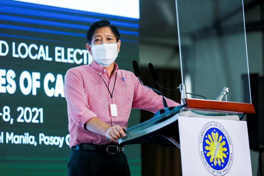 Ferdinand Marcos Jr, the son of late Philippines dictator Ferdinand Marcos, delivers a message after filing his certificate of candidacy for president in the 2022 national election, in Pasay City, Metro Manila, Philippines, 6 October 2021. (Rouelle Umali/Pool via Reuters)