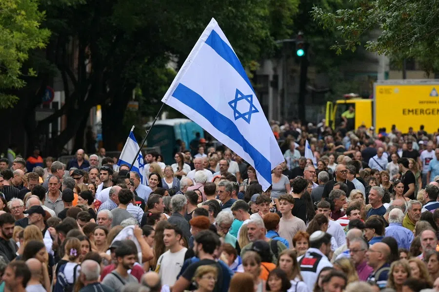 People march as they demand the release of all remaining hostages held in Gaza since Hamas’s attack on Israel, during a demonstration called by the Jewish community in Buenos Aires on 24 February 2025. (Juan Mabromata/AFP)