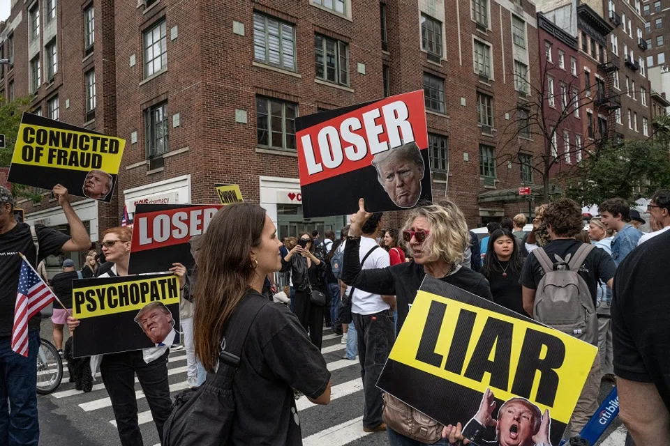 Activists participate in an impromptu protest against former President Donald Trump on 18 September 2024 in New York City. (Stephanie Keith/Getty Images via AFP)