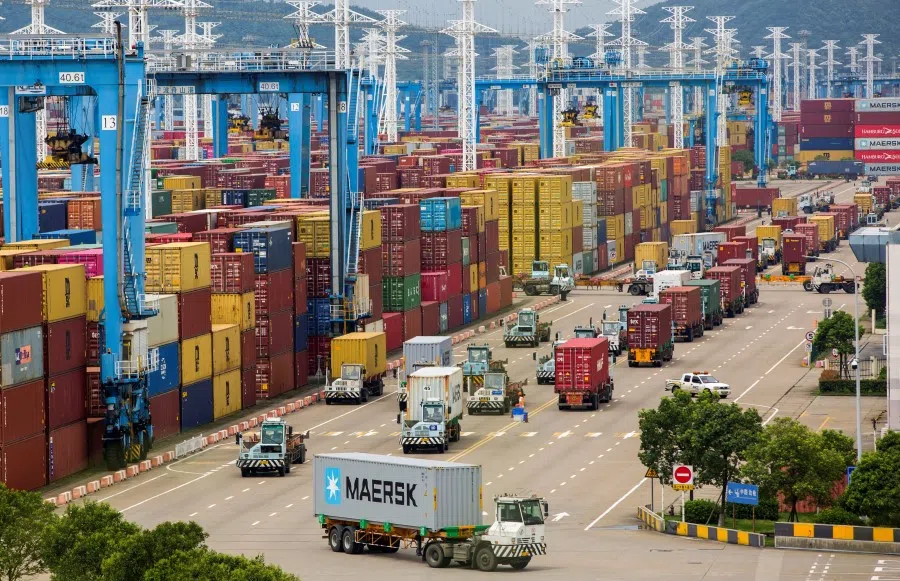 Lines of trucks are seen at a container terminal of Ningbo Zhoushan port in Zhejiang province, China, 15 August 2021. (cnsphoto via Reuters)