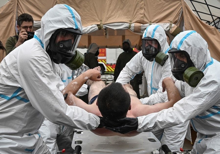 Rescuers and police officers attend anti-radiation drills in case of an emergency situation at Zaporizhzhia Nuclear Power Plant, amid Russia's attack on Ukraine, in Zaporizhzhia, Ukraine, 29 June 2023. (Stringer/Reuters)