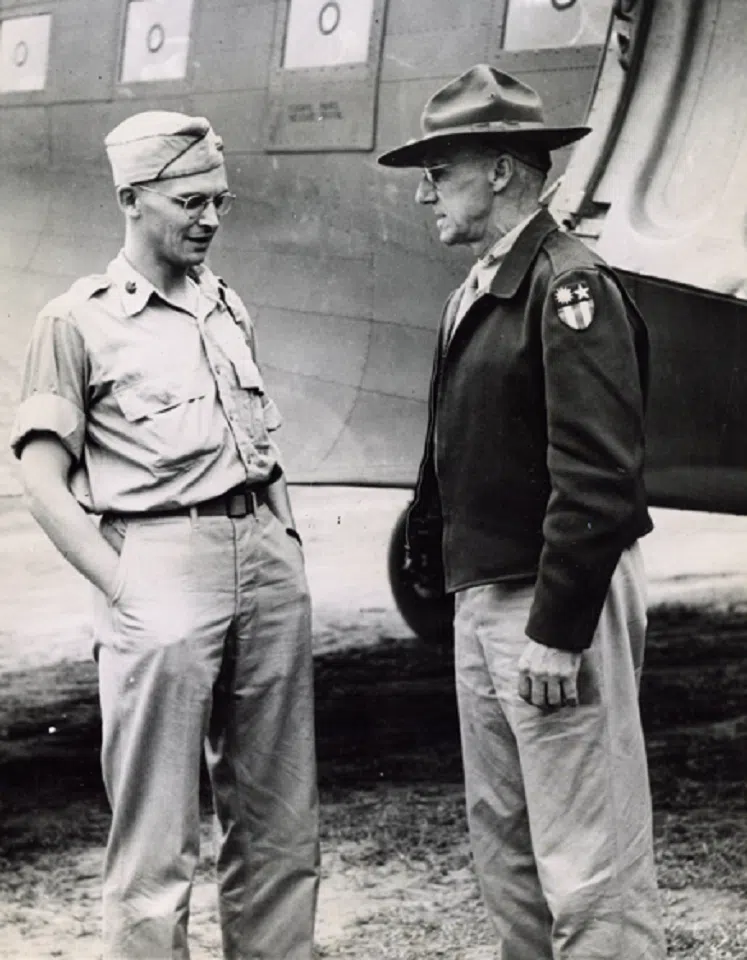 General Stilwell greets his son, Joseph Stilwell, Jr. at an airfield in China on 9 August 1943.