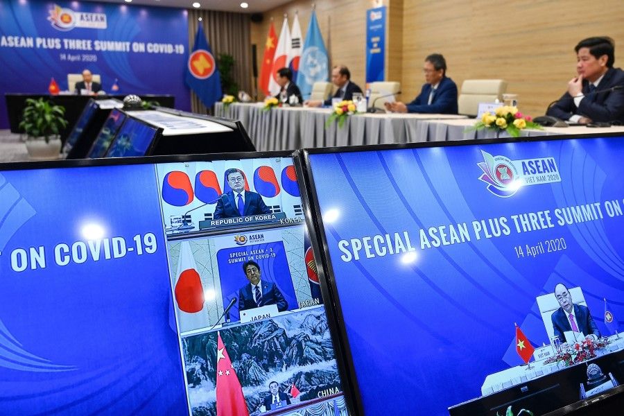 A live video conference on the special Association of Southeast Asian Nations (ASEAN) Plus Three Summit on the COVID-19 coronavirus pandemic in Hanoi on 14 April 2020. (Manan Vatsayana/AFP)