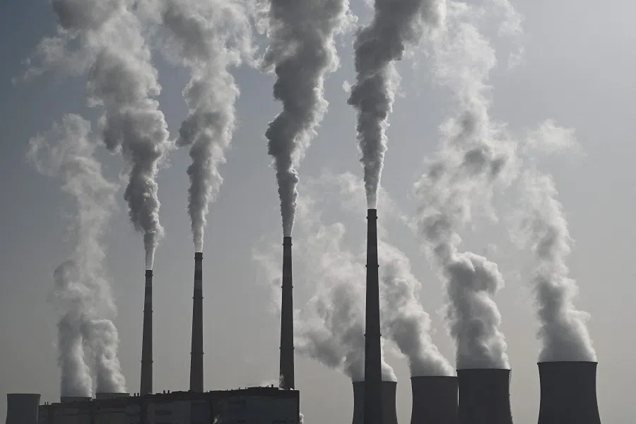 This picture shows the coal-powered Datang International Zhangjiakou Power Station in Zhangjiakou, Hebei province, China, on 15 November 2021. (Greg Baker/AFP)