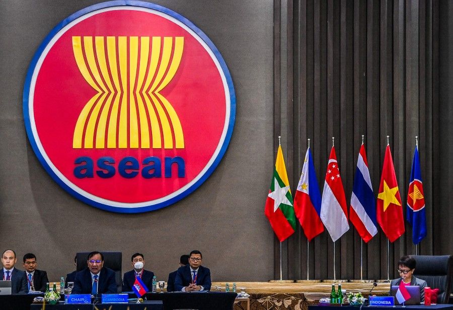This handout picture taken and released on 27 October 2022 by the Indonesian ministry of foreign affairs shows the foreign ministers of the Association of Southeast Asia Nations (ASEAN) countries attending the Special ASEAN Foreign Ministers' Meeting (SAFMM) at the ASEAN secretariat general building, in Jakarta. (Handout/Indonesian Foreign Ministry/AFP)