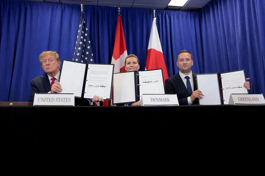 US President Donald Trump, Danish Prime Minister Mette Frederiksen and Greenland Prime Minister Jens-Frederik Nielsen show signed documents during a trilateral signing event regarding a deal on Greenland's security, during the 81st United Nations General Assembly (UNGA), in New York City, US, 22 September 2026.