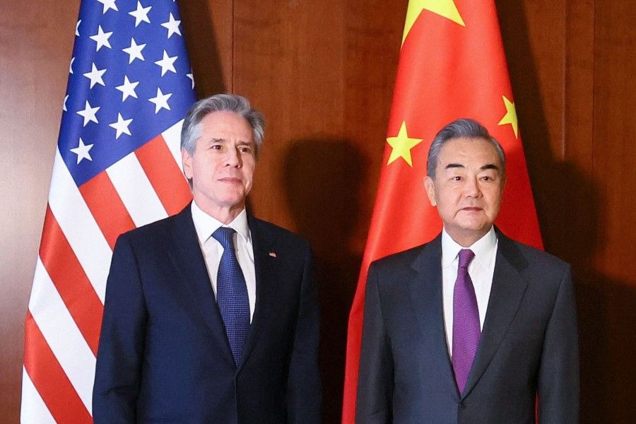 US Secretary of State Antony Blinken (L) and Chinese Foreign Minister Wang Yi as they meet at the 60th Munich Security Conference (MSC) at the Bayerischer Hof Hotel in Munich, southern Germany, on 16 February 2024. (Wolfgang Rattay/AFP)