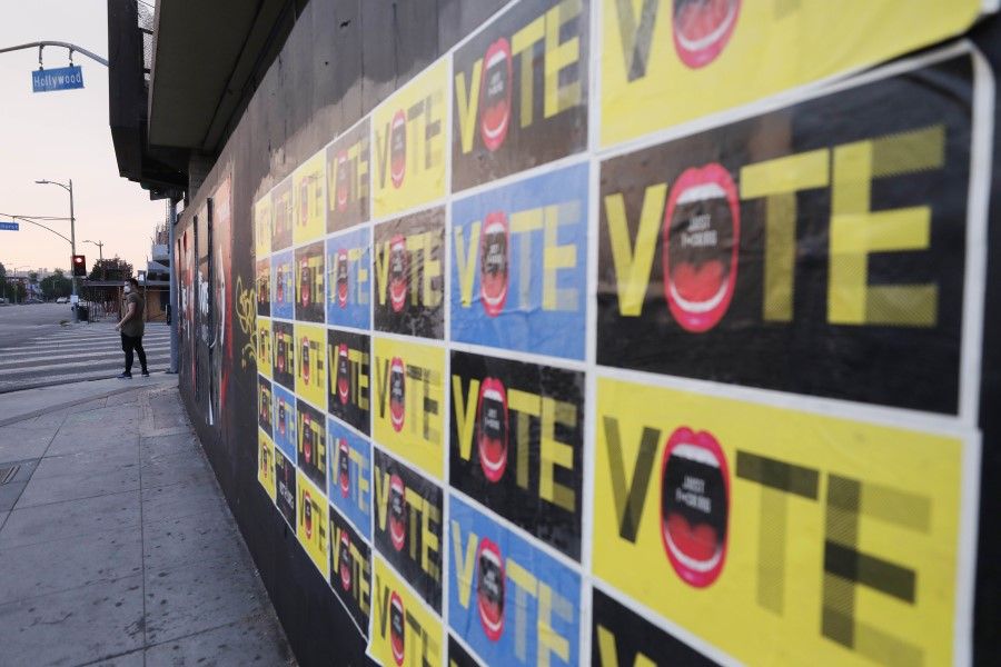 A poster reads 'Vote' on 3 October 2020 in Los Angeles, California. (Mario Tama/AFP)