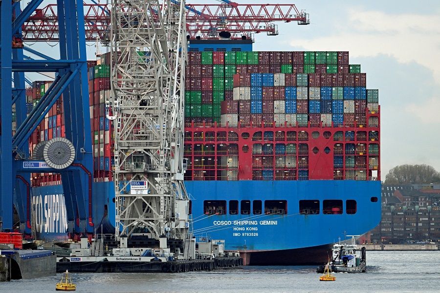 Cargo ship 'Cosco Shipping Gemini' of Chinese shipping company 'Cosco' is loaded at the container terminal 'Tollerort' in the port in Hamburg, Germany, 25 October 2022. (Fabian Bimmer/Reuters)