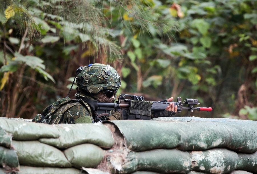 A soldier participates in a military exercise simulating an invasion by China, organised by Taiwan's Army Infantry Training Command, in Kaohsiung, Taiwan, on 6 January 2022. (I-Hwa Cheng/Bloomberg)
