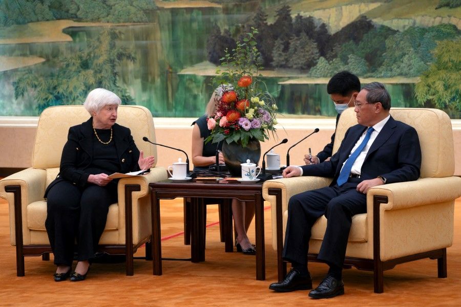 US Secretary of the Treasury Janet Yellen, left, speaks as Chinese Premier Li Qiang, right, listens during a meeting at the Great Hall of the People in Beijing, China, on 7 July 2023. (Mark Schiefelbein/Pool via Reuters)