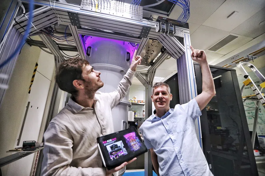 Nanyang Technological University (NTU) Associate Professor Rainer Dumke (right) with AQSolotl CEO Patrick Bore (left), with their Chronos-Q quantum controller in the quantum computer at NTU. Singapore has adopted a diversified strategy in quantum computing to reduce risks and increase innovation. (SPH Media)