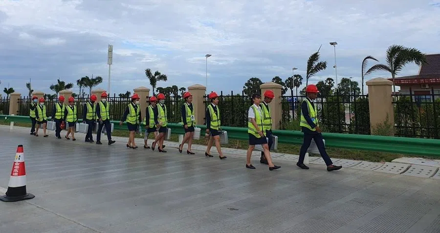 Employees of the company that runs Phnom Penh-Sihanoukville Expressway heading to work in the morning, 16 August 2023.