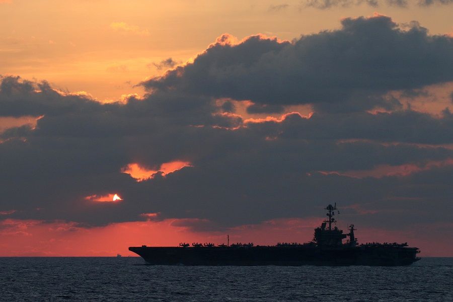 The US Navy aircraft carrier USS John C. Stennis transits the South China Sea at sunset, 25 February 2019. (US Navy/Mass Communication Specialist 1st Class Ryan D. McLearnon/Handout via Reuters)