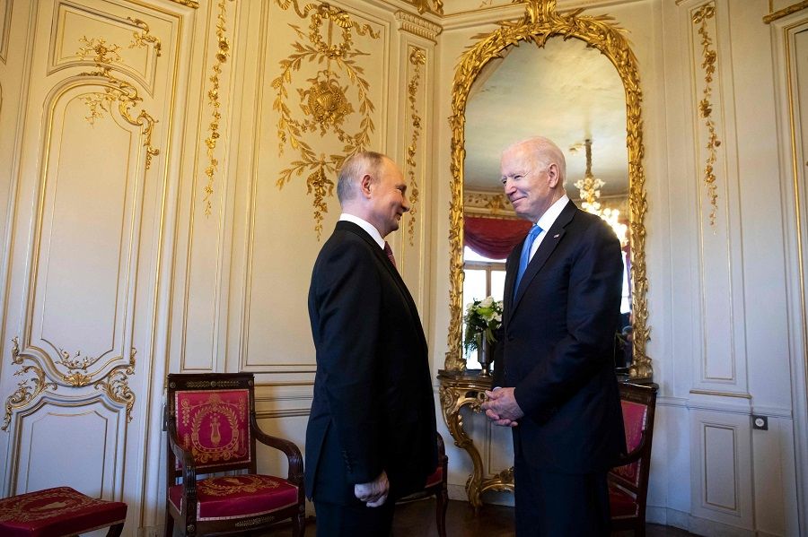 US President Joe Biden (right) talks to Russian President Vladimir Putin prior to the US-Russia summit at the Villa La Grange, in Geneva, Switzerland on 16 June 2021. (Peter Klaunzer/Pool/AFP)