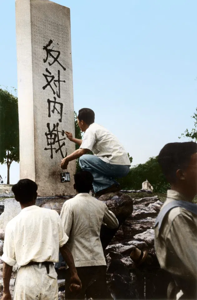 May 1947: University students against the civil war writing slogans. Subsequently, it was revealed that this student movement was secretly initiated by the CCP's underground organisation.