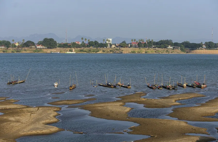 Fishing boats are moored in Mekong River, in Nakhon Phanom province, northeastern Thailand, December 2019. (Chessadaporn Buasai/AFP)