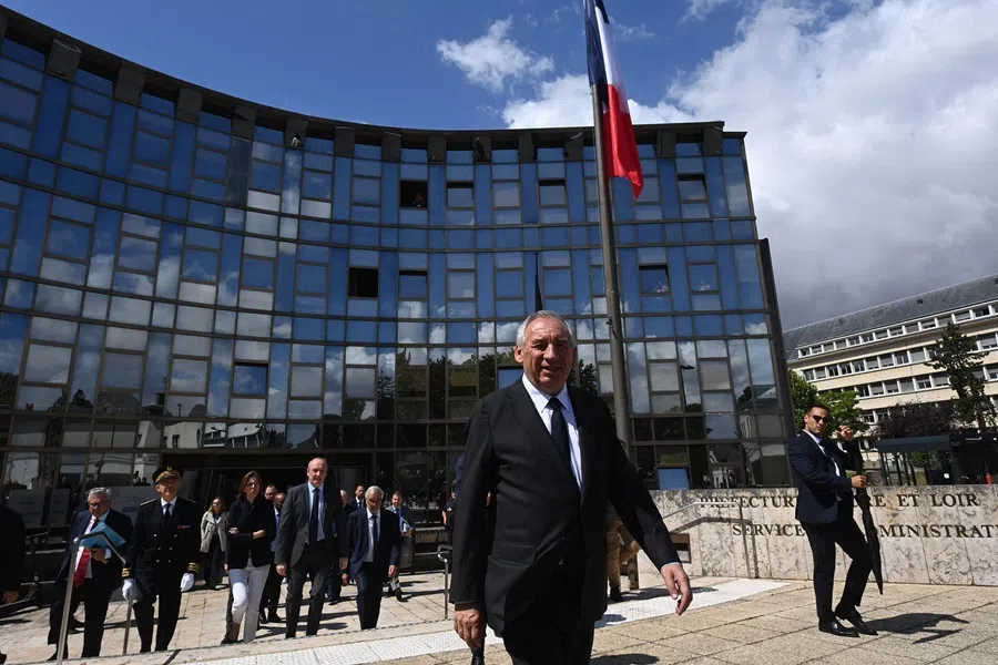 French Prime Minister Francois Bayrou leaves after presenting the reform of the State's territorial administration to regional and departmental prefects and to the secretaries-general of ministries, at the prefecture of Eure-et-Loir, in Chartres, central France, on 8 July 2025. (Jean-Francois Monier/AFP)