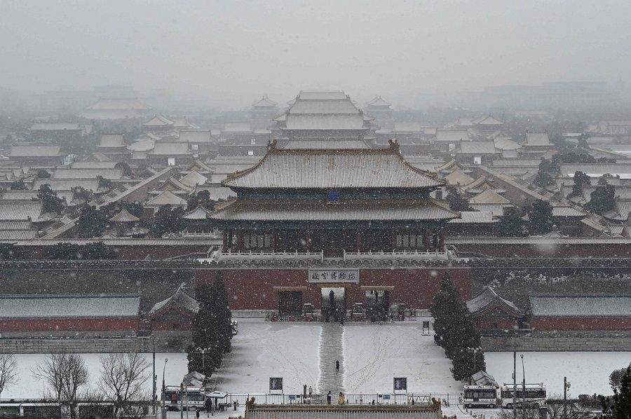 A general view shows the Forbidden City in Beijing, China, on a snowy day at Jingshan Park on 20 January 2022. (Jade Gao/AFP)