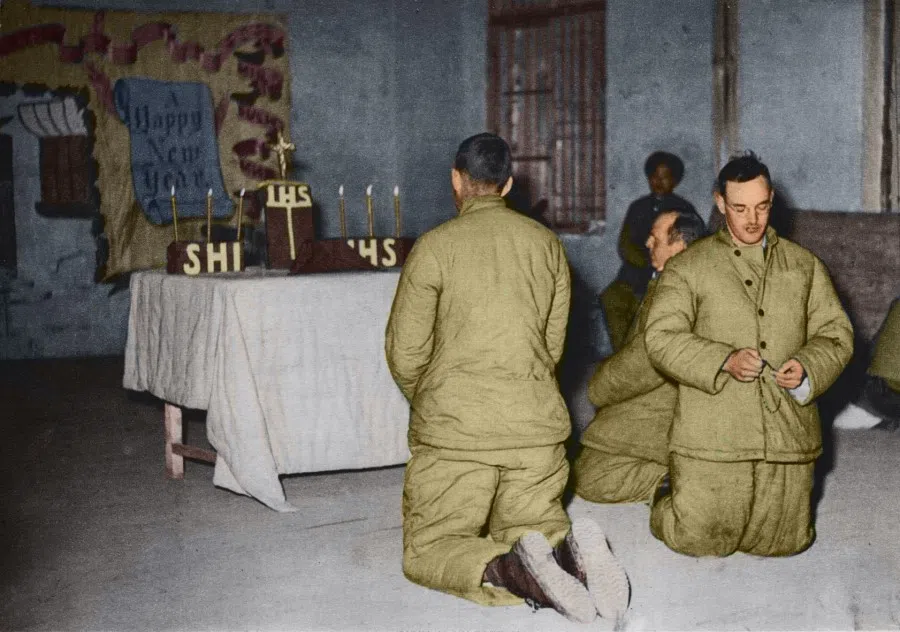 UNC POWs at Sunday service; their religious needs were respected.