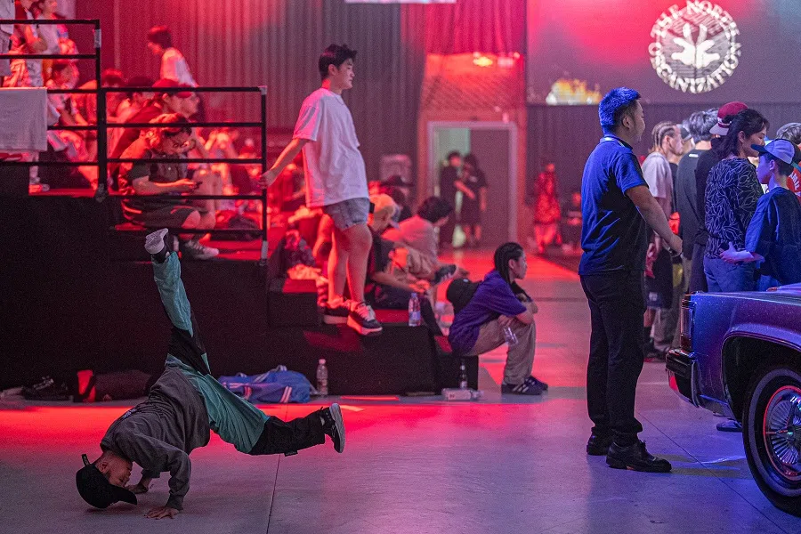 Niu Yiming warms up before an underground breaking competition in Beijing on 28 June 2024.