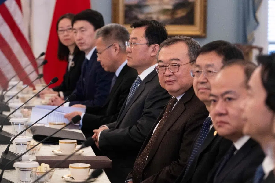 Chinese International Liaison Department Minister Liu Jianchao (fourth from right) meets with US Secretary of State Antony Blinken at the State Department in Washington, DC, on 12 January 2024. (Roberto Schmidt/AFP)