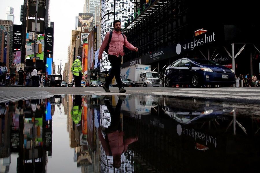 People walk through Times Square in New York City, US, on 16 June 2023. (Leonardo Munoz/AFP)