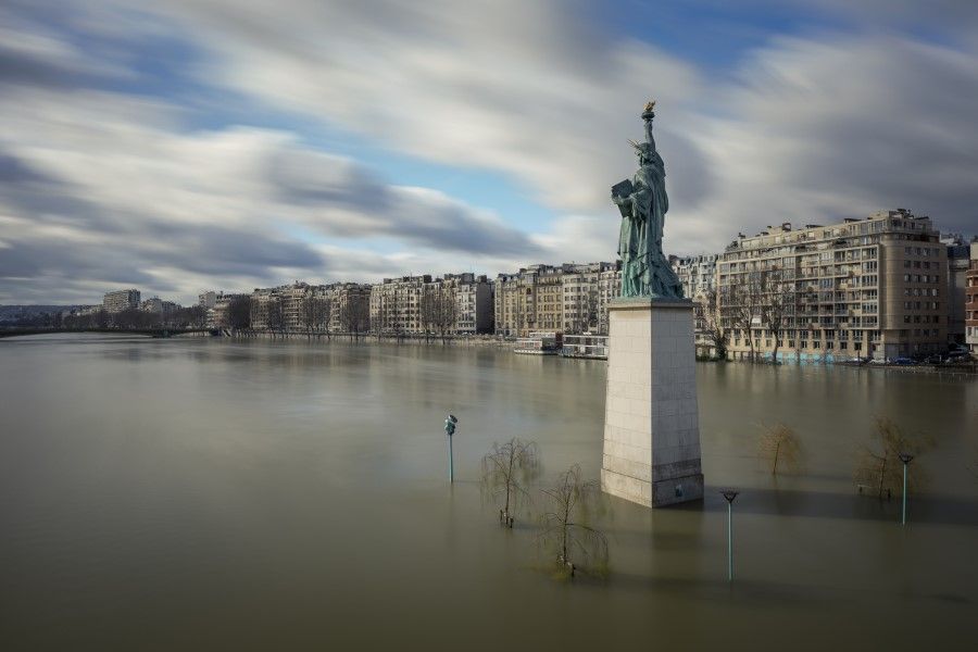 The Statue of Liberty in Paris, during a winter flood. Humans have always struggled to master nature. (iStock)
