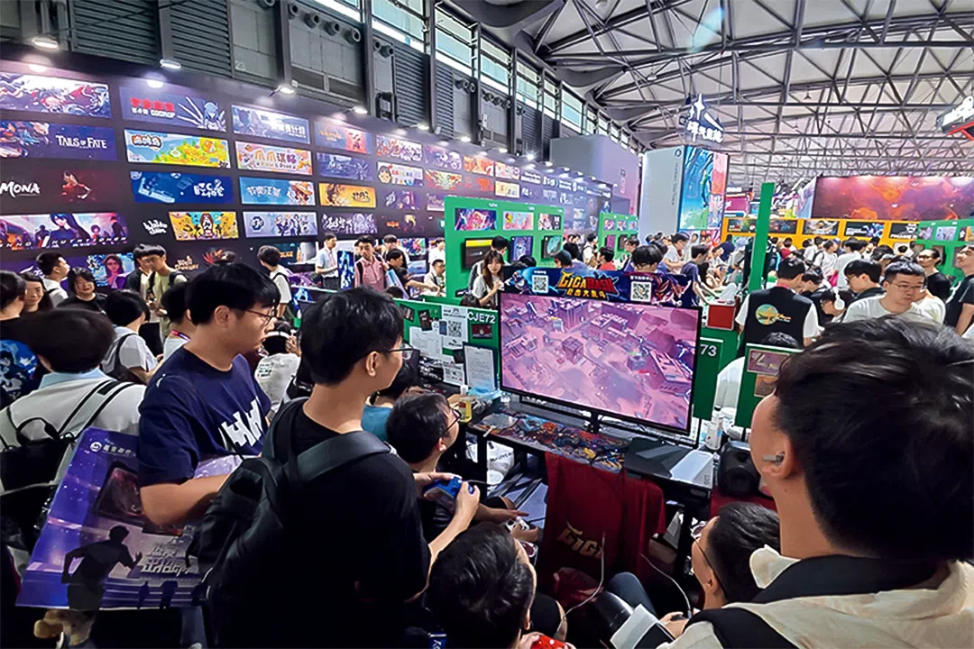 Visitors try out new games at the ChinaJoy conference on 1 August 2026.