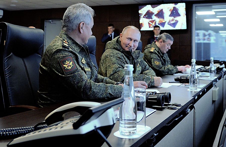 Russian President Vladimir Putin (centre), accompanied by Defence Minister Sergei Shoigu (left) and Valery Gerasimov, the chief of the Russian General Staff, oversees the Vostok 2022 military exercises at the Sergeevskyi training ground outside the city of Ussuriysk on the Russian Far East on 6 September 2022. (Mikhail Klimentyev/Sputnik/AFP)