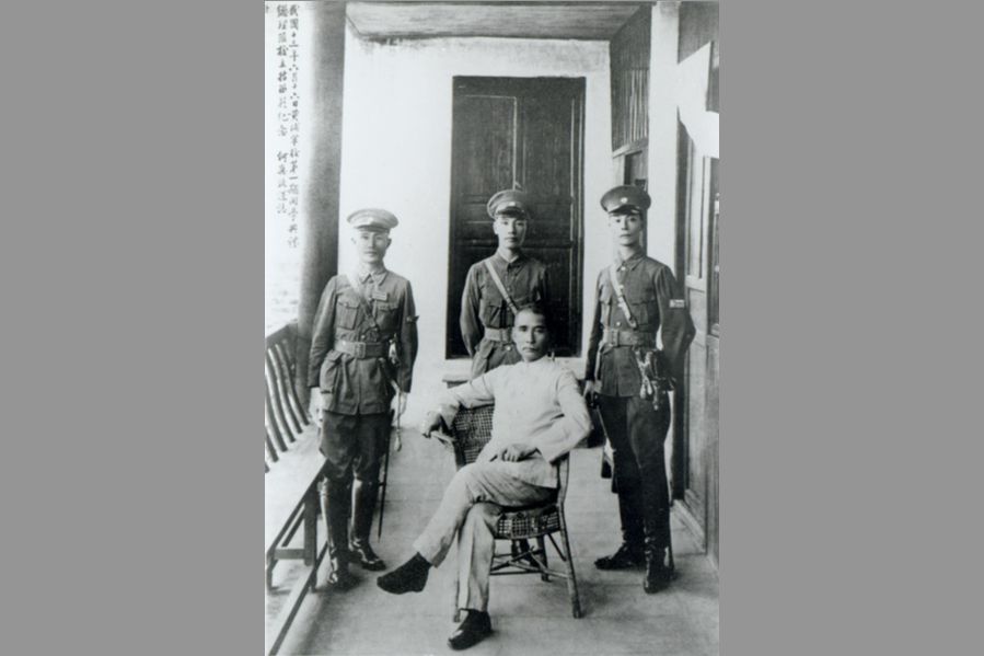 Sun Yat-sen (seated) at the opening ceremony of the Whampoa Military Academy on 16 June 1924. Standing (from left): He Yingqin, Chiang Kai-shek, Wang Boling. (Wikimedia)