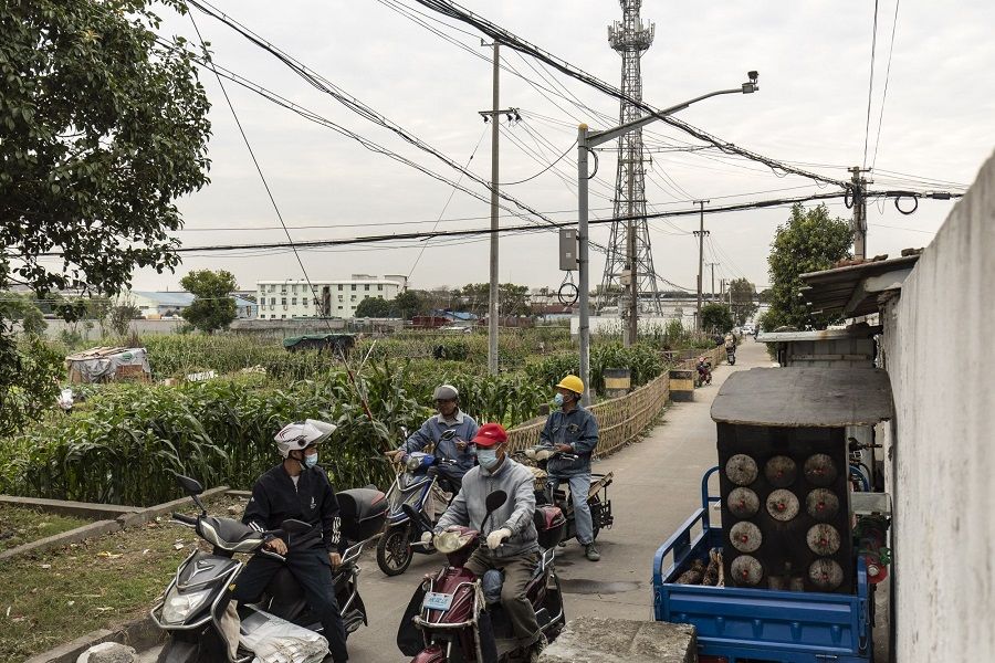 Motorists in the village of Zhongjie in Shanghai, China, on 11 October 2022. (Qilai Shen/Bloomberg)