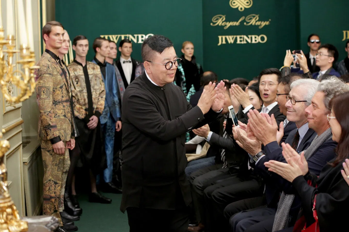 Ji Wenbo (centre) at the 2014 Paris Fashion Week.