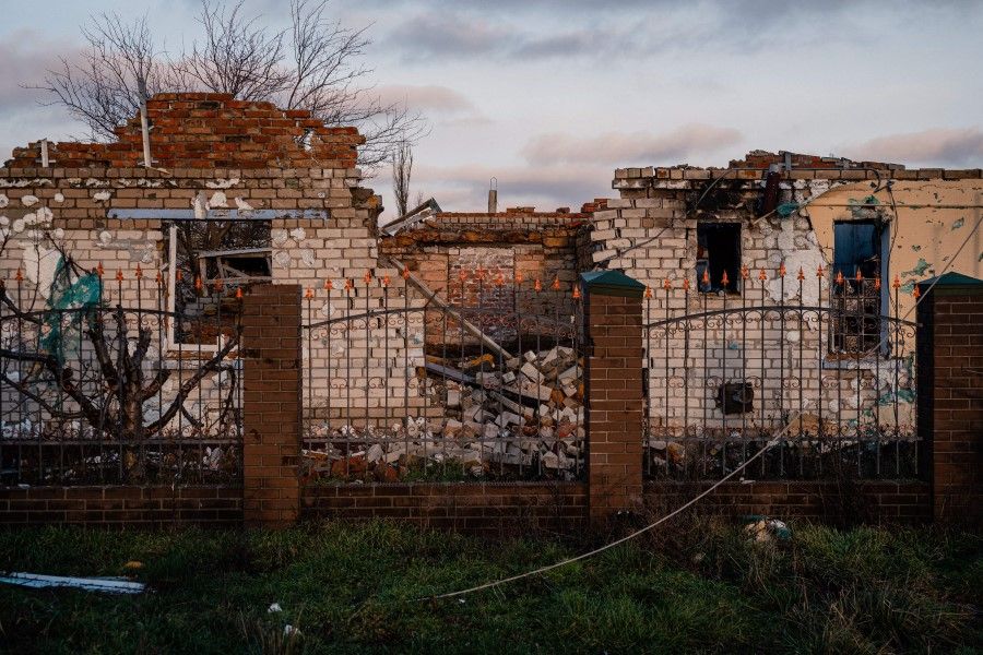 This photograph taken on 26 December 2022, shows the destroyed houses Posad-Pokrovs'ke village, Kherson region, amid the Russian invasion of Ukraine. (Dimitar Dilkoff/AFP)