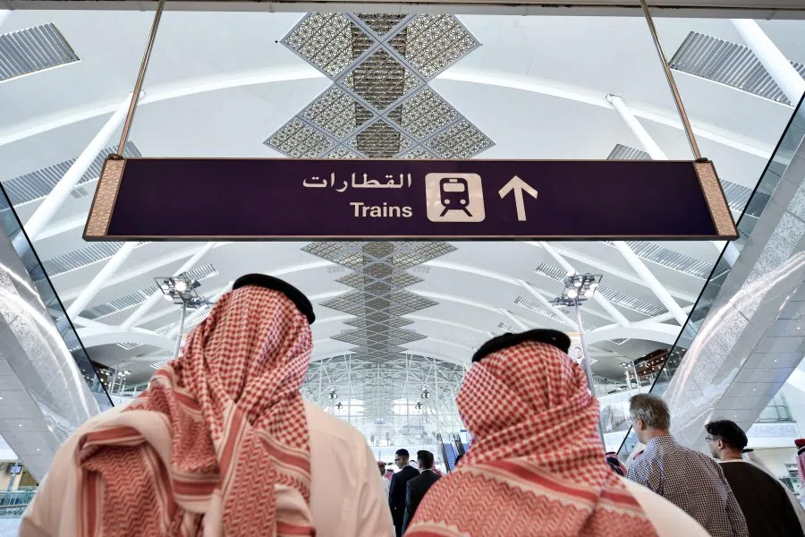 Singapore and China can cooperate on projects in third-party countries and regions such as the Middle East. (Giuseppe Cacace/AFP)