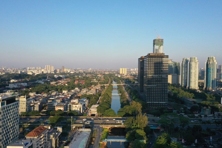 This aerial photo shows high rise buildings and residential areas in Jakarta on 25 August 2020. (Adek Berry/AFP)