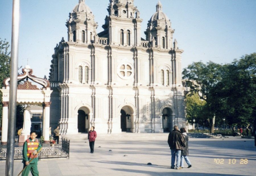 The Catholic church on Wangfujing Street in Beijing, 2002. Many Chinese believers come here to worship.