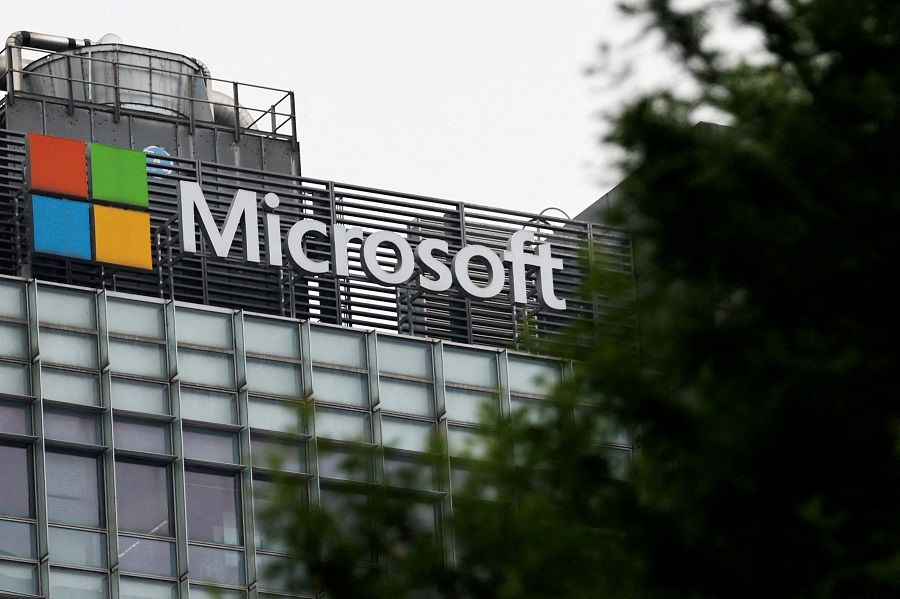 The logo of Microsoft is pictured on its office building in Beijing, China, 25 May 2023. (Tingshu Wang/File Photo/Reuters)