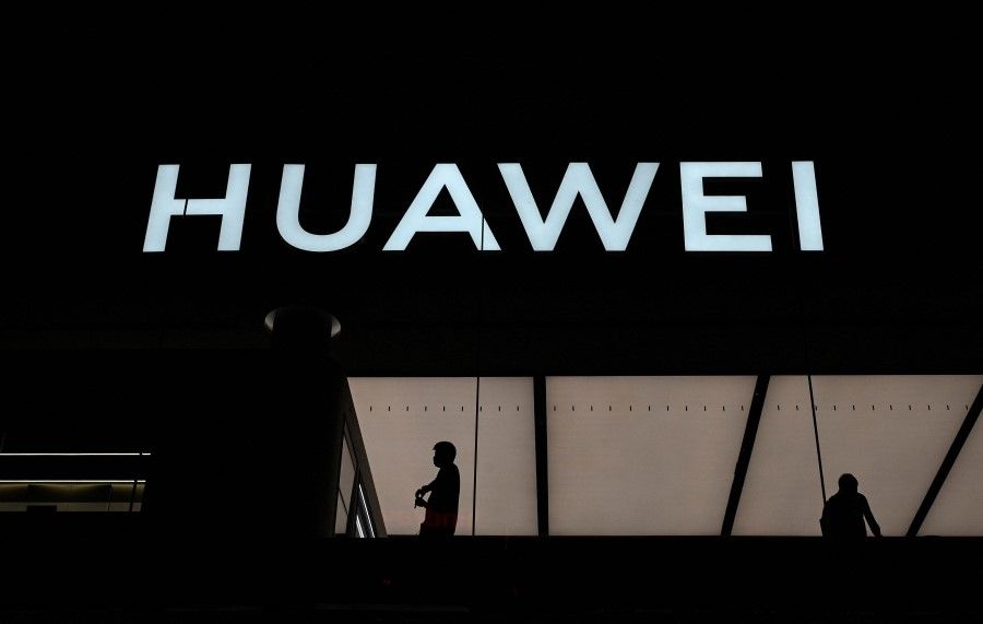This photo taken on 12 July 2022, shows the logo of the Huawei flagship store in Shenzhen, in China's southern Guangdong province. (Jade Gao/AFP)