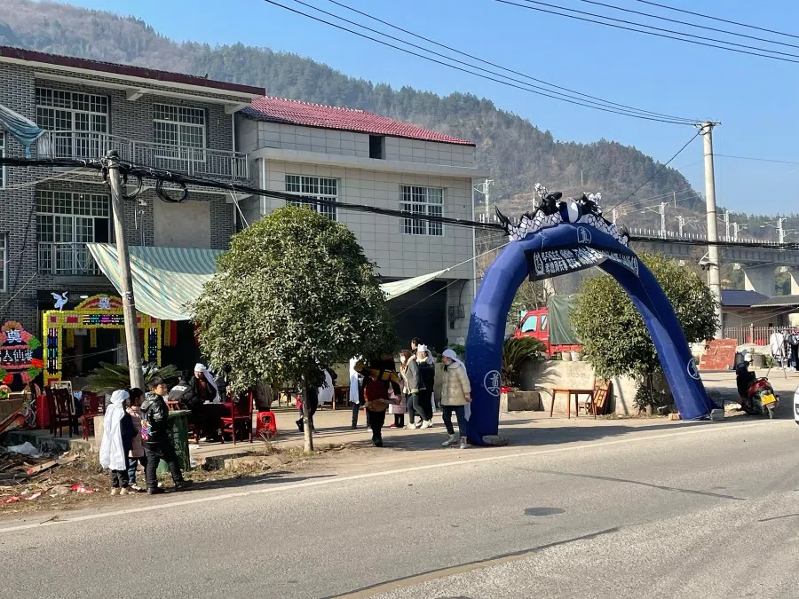 A blue arch outside a residence in Zhangjiajie, 8 January 2023.