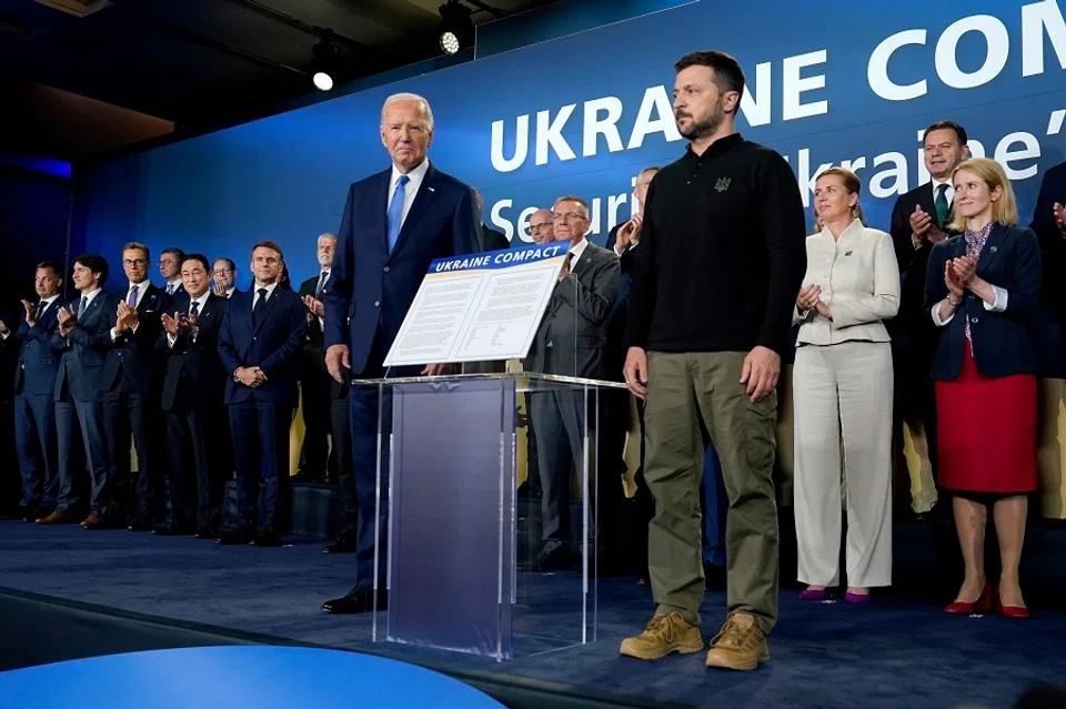 US President Joe Biden, center left, and Volodymyr Zelenskiy, Ukraine’s president, center right, at a meeting on the Ukraine Compact during the NATO Summit in Washington, DC, US, on 11 July 2024. (Chris Kleponis/CNP/Bloomberg)